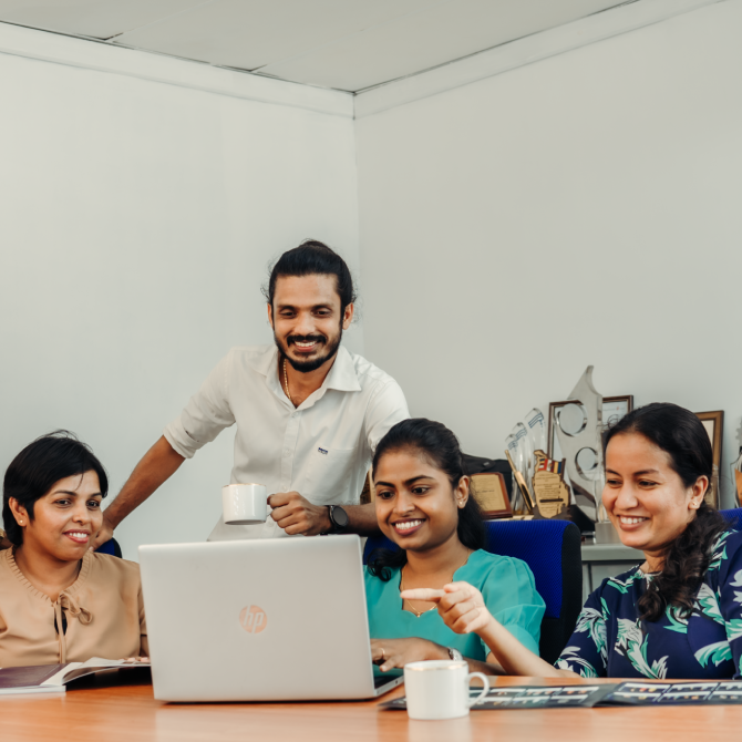 A group of team members working together at Sierra Cables PLC